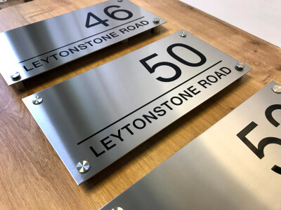 steel house sign