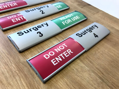 sliding business signs